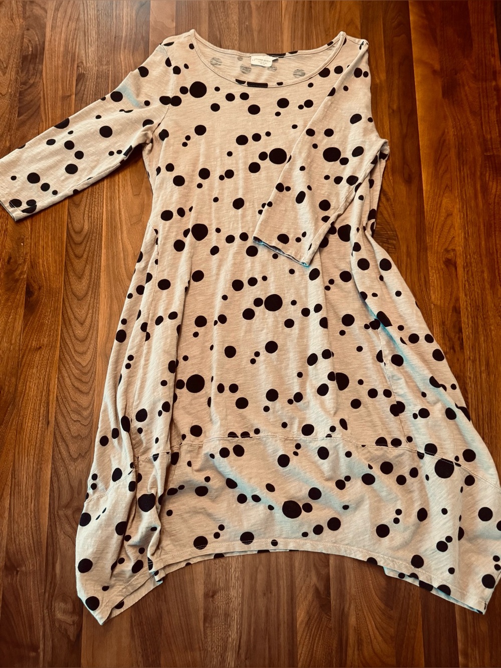 Beige and Black Polka Dot Swing Dress with Three-Quarter Sleeves.